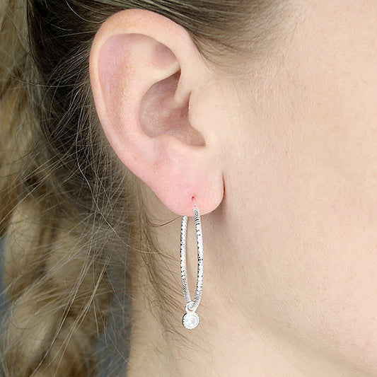 Fancy white cubic zirconia charm on a 37mm textured top-hinged hoop